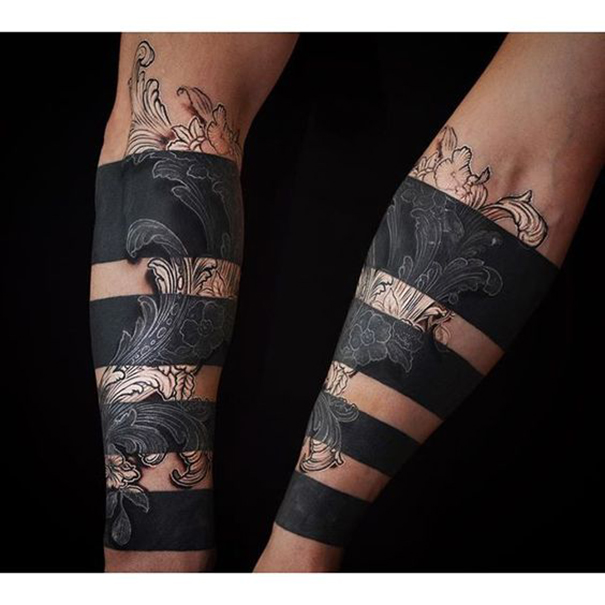 tatuagem blackwork incrível no braço 