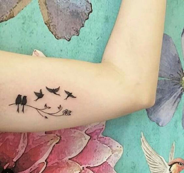 tatuagem de família no braço 