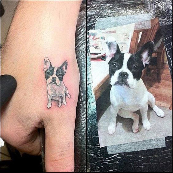 tatuagem de cachorro na mão 