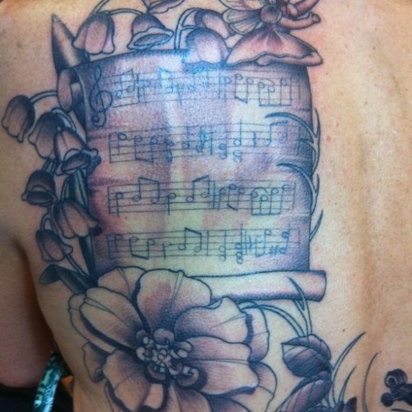 35 Melodious Music Notation Tattoos 8 