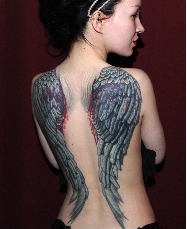 tatuagens de costas para mulheres 