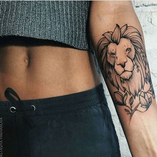 tatuagem de leo no braço 