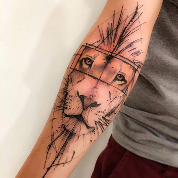 tatuagem de leão no braço 