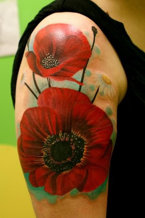 flor de papoula manga tatuagem parece flutuando no braço 