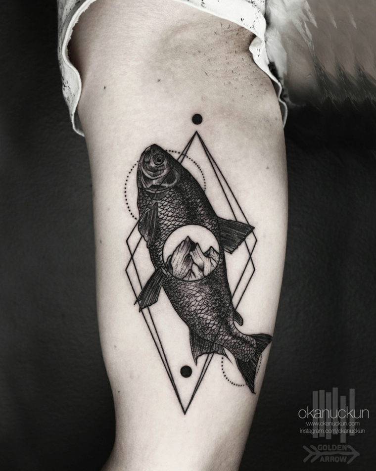 Forma de tatuagem Okan Uçkun peixe 