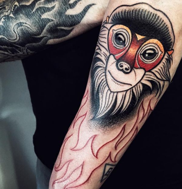 Tatuagem de macaco no braço 