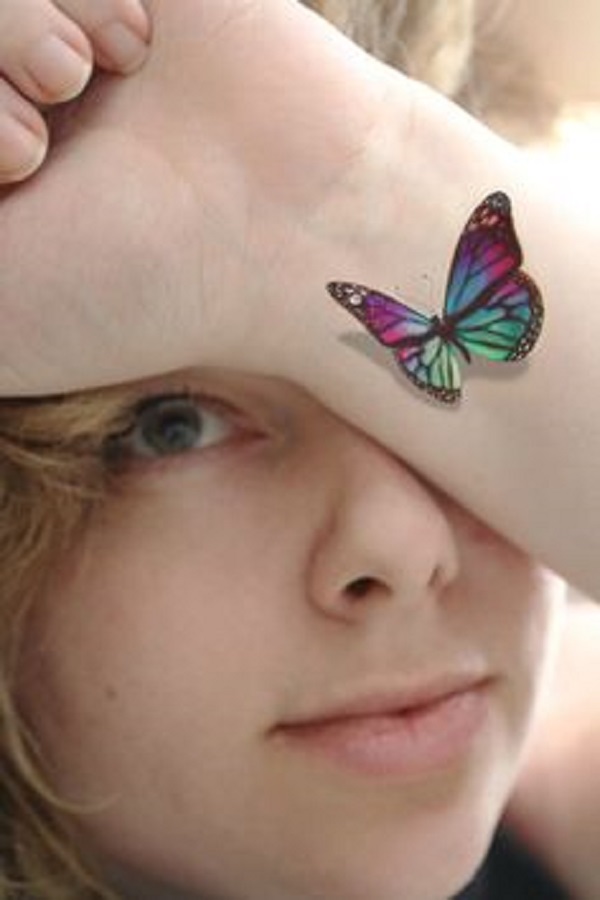 Meu olho e tatuagem de pulso de borboleta 