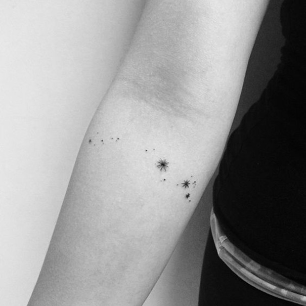 tatuagem estrela no braço 