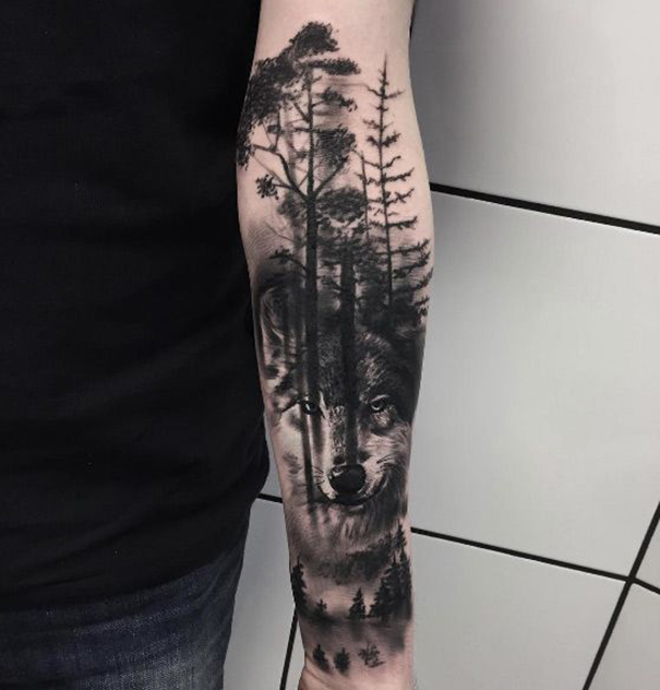 tatuagem de lobo no braço 