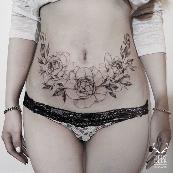 40 melhores exemplos de tatuagens de estômago 27 
