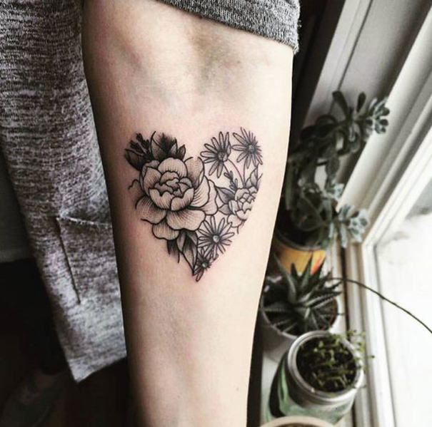 tatuagem de coração no braço 