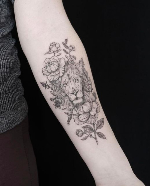tatuagem de leão no braço 