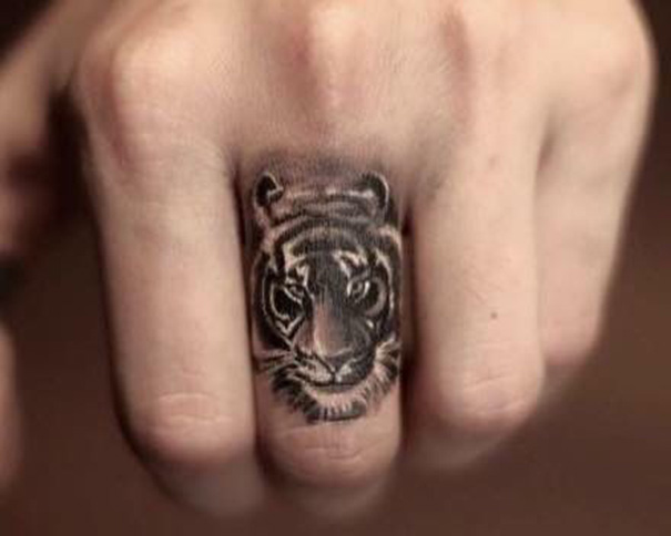 Tatuagens de tigre no dedo 
